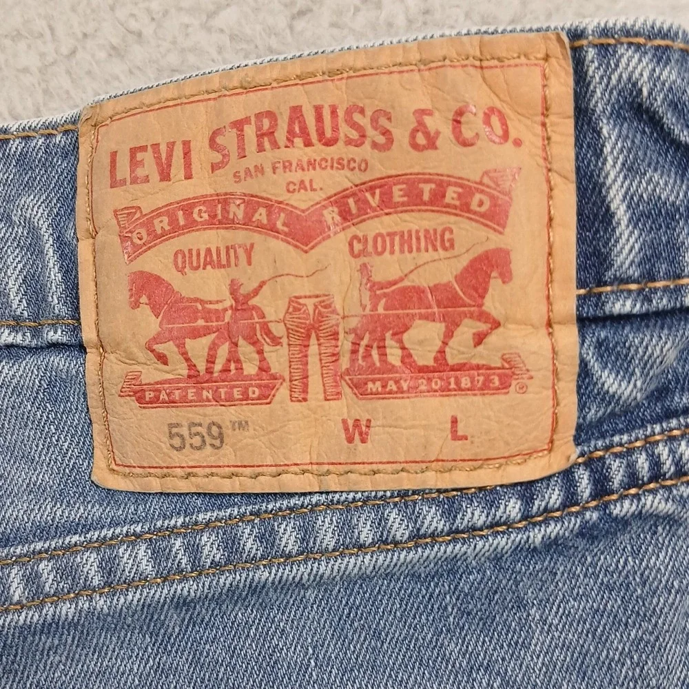Levi's 559 Relaxed Straight Jeans‎ Mens 52x32 Light Wash Blue Denim EUC